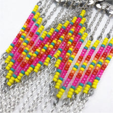 Load image into Gallery viewer, Large Silver Concho with dangly beading in yellow, hot pink, orange and turquoise finished on fishhooks