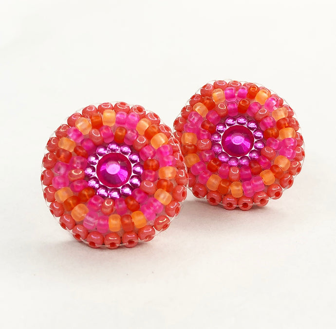 Small, round, beaded stud earrings in coral, hot pink and orange 