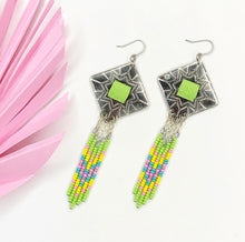 Load image into Gallery viewer, Diamond shaped silver concho with lime green, pink, yellow and turquoise dangling bead work on fishhooks