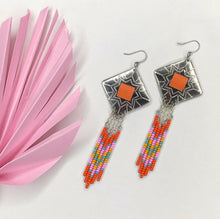 Load image into Gallery viewer, Diamond shaped silver concho with orange, pink, turquoise and yellow dangling bead work on fishhooks
