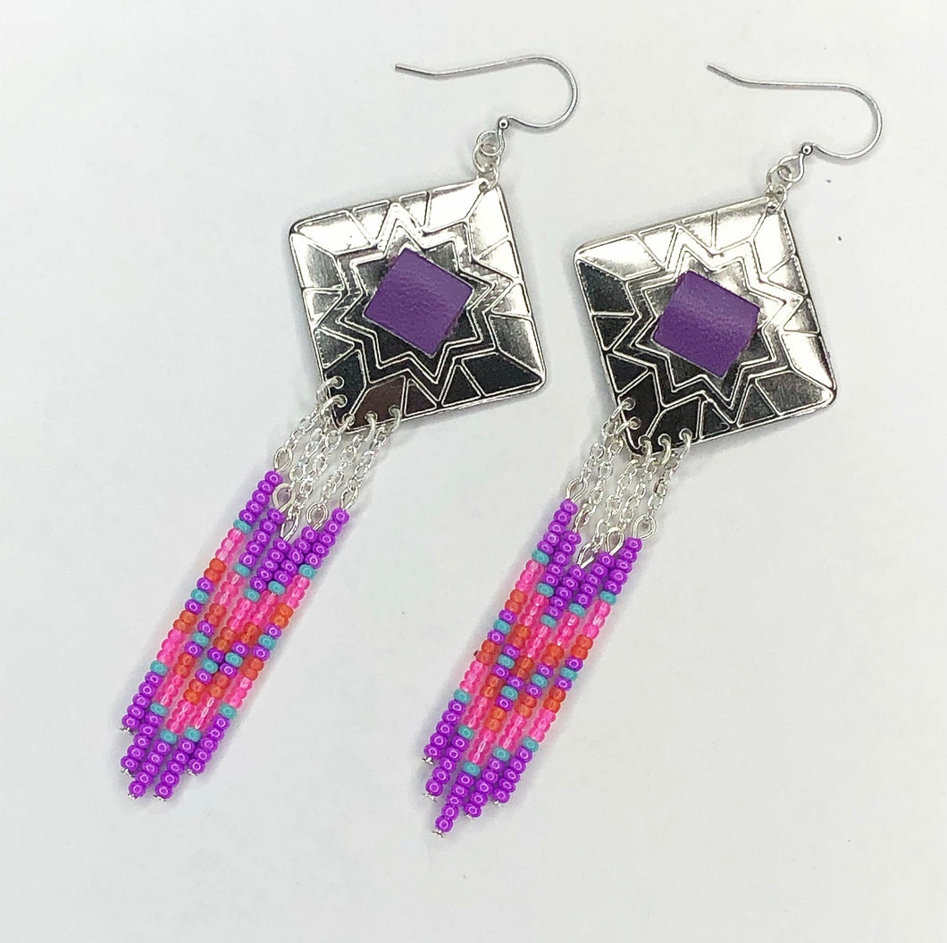 Diamond shaped silver concho with purple, hot pink, coral and turquoise dangling bead work on fishhooks