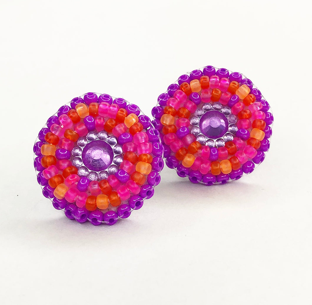 Small, round, beaded stud earrings in purple, coral, hot pink and orange 
