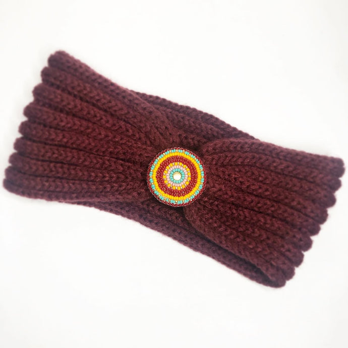 Burgundy knit winter headband with beaded medallion