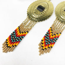 Load image into Gallery viewer, Large Gold Concho with dangly beading in golden yellow, orange, red and turquoise finished on fishhooks
