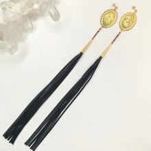 Load image into Gallery viewer, Gold Concho Earring with deep yellow, orange, red and turquoise beading and long black leather tassels on stud post
